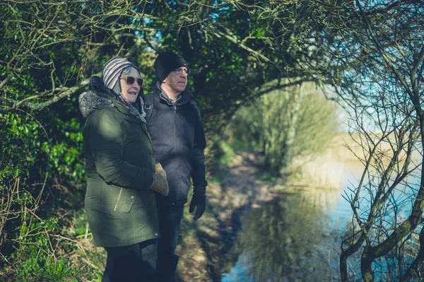 Senior Couple Enjoying Retirement Lake Winter — Stock Photo, Image