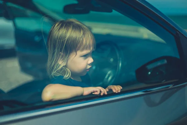 Little Toddler Looking Out Window Car Driver Seat — Stock Photo, Image