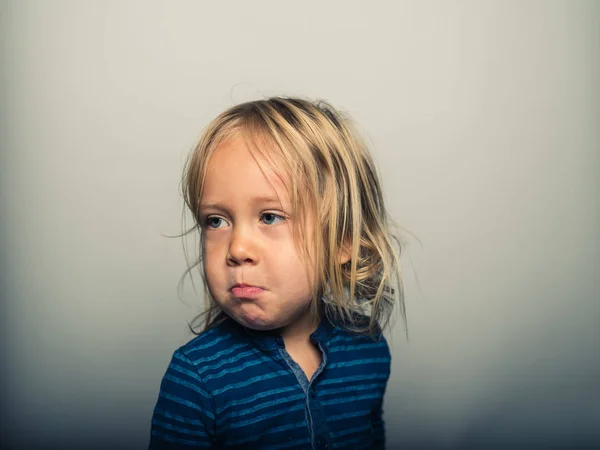 Portrait of toddler pulling faces — Stock Photo, Image