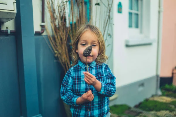 Little Toddler Holding Pine Cone Outdoors — Stock Photo, Image