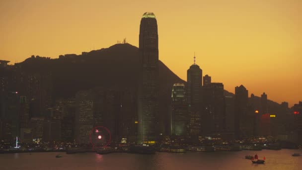 Hong Kong, China - DIC 06, 2019: 4k Victoria harbour sunset skyline — Vídeos de Stock