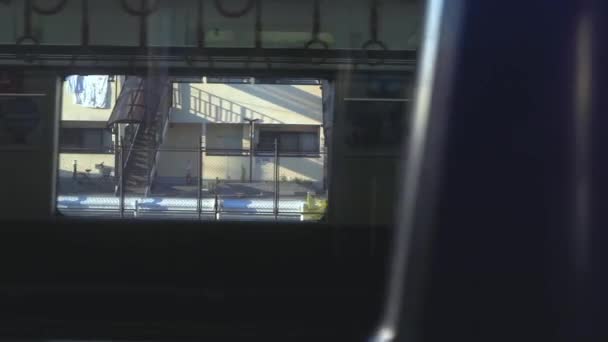 Az elhaladó JR-vonat lassú mozgása — Stock videók