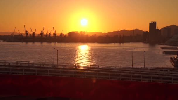 Kobe, Japan - NOV 05, 2019: Solnedgång i hamn i 4k — Stockvideo