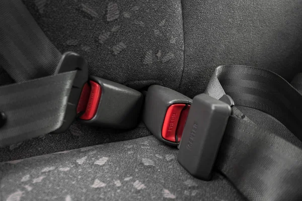 car three-point safety belt, buttoned, the concept of road safety, life and health of the driver and passengers, compliance with traffic rules