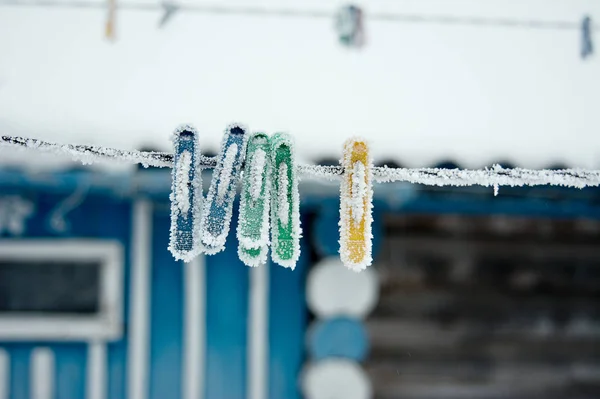 Frozen Icy Snow Covered Clothespins Winter Low Temperatures — Stock Photo, Image