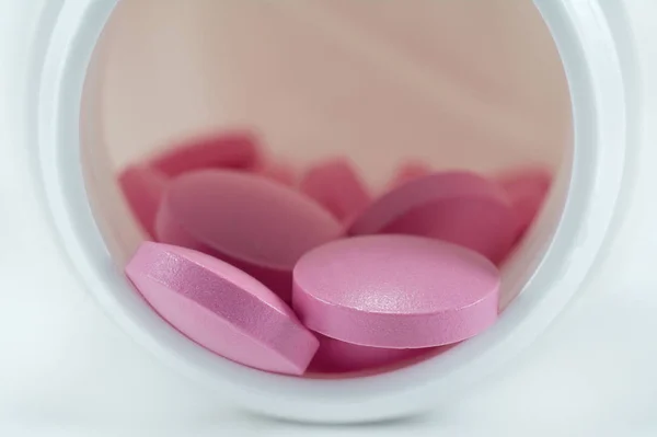 pink pills close-up macro, meds