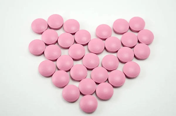 Heart Lined Pills Light Background — Stock Photo, Image