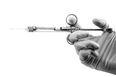 dentist's hand with carpool syringe for local anesthesia on white background isolated, black and white clipart