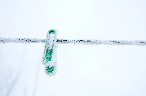 Frozen Icy Snow Covered Clothespins Winter Low Temperatures — Stock Photo, Image