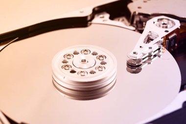 the internal structure of a hard disk reading head, toned