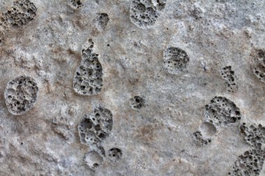 the structure of the stone, the texture of the concrete, background, closeup