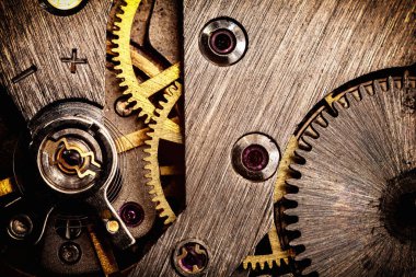 vintage old mechanism with gears and springs, clock mechanism close-up macro