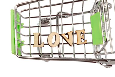 shopping cart with the inscription love lined with letters, the concept of a love sensual, money can not buy the love