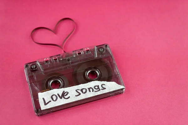 Vintage Old Film Music Cassette Trendy Pink Background Inscription Love — Stockfoto