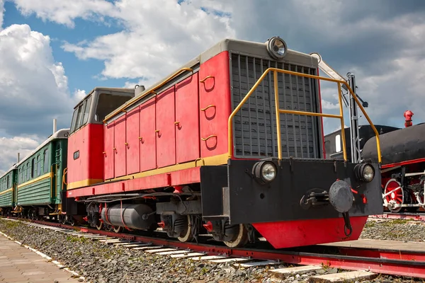 vintage steam train hurtling at speed along the rails, retro vehicle, steam engine