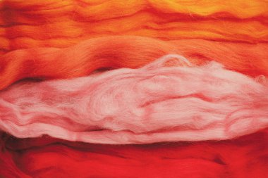 felting natural merino wool close-up background