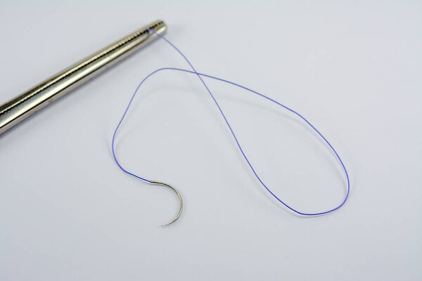 medical thread for suturing wounds, surgical needle holder, suturing in medical and dental practice