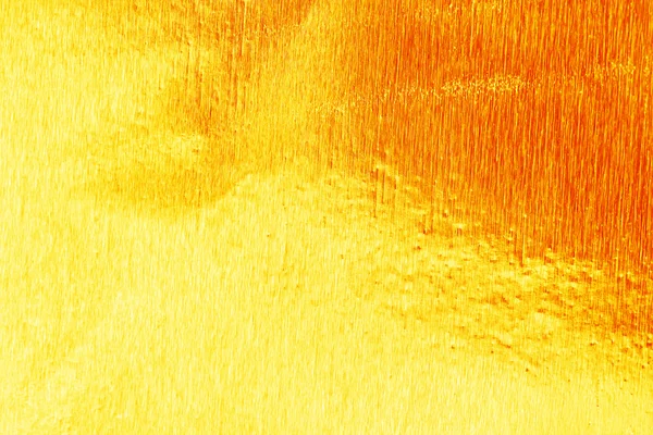Textura din folie de aur galben strălucitor pentru fundal și umbră. Aur — Fotografie, imagine de stoc