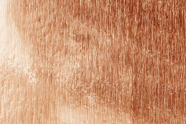 Glänzende Folienstruktur für Hintergrund und Schatten. roségoldene Farbe — Stockfoto