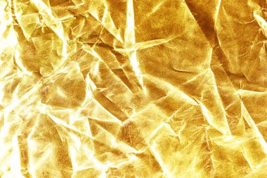 Altın arka plan veya doku ve gölge. Altın kumaş giderilmesi