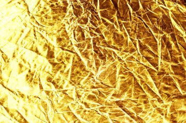 Altın arka plan veya doku ve gölge. Altın kumaş giderilmesi