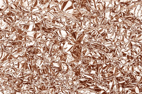Folia błyszcząca tekstura tło. Kolorze różowego złota — Zdjęcie stockowe