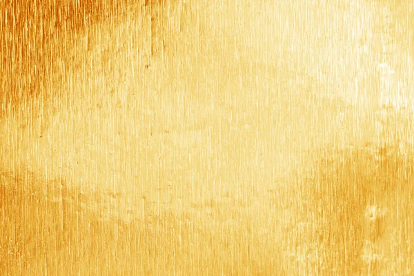Parlak sarı altın folyo doku için arka plan ve gölge. Altın — Stok fotoğraf