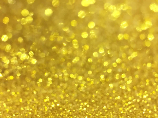 Abstract gold bokeh circles for christmas background, glitter li