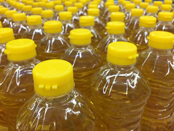 Vegetable oil in plastic bottles for background — Stock Photo, Image