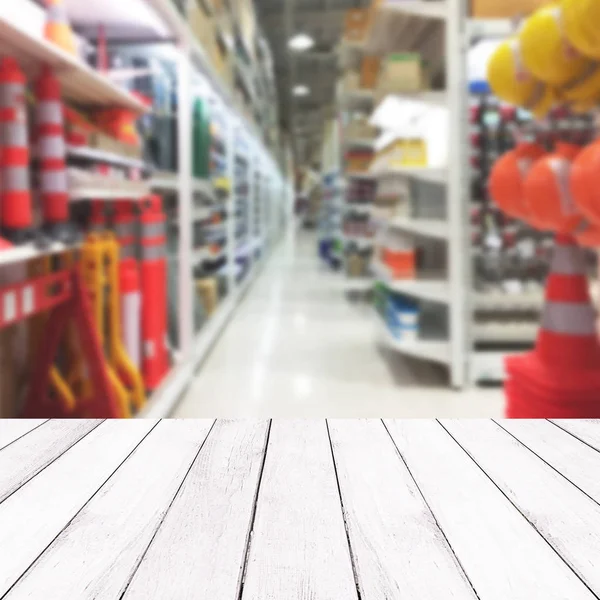 Wooden white balcony on blur of inside tools department store ba — Stock Photo, Image