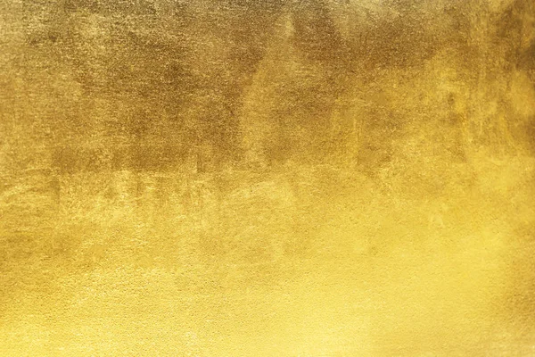 Guld bakgrund eller struktur och radienter skugga — Stockfoto