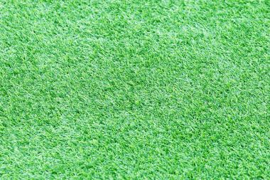 Yeşil suni çim doku ya da arka plan ve boş yer