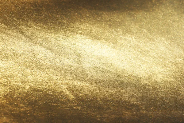 Guld bakgrund eller struktur och radienter skugga — Stockfoto