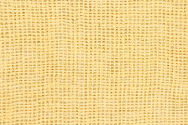 Gelbe Textur aus leichtem Sacktuch oder Hintergrund für Ihr Design — Stockfoto