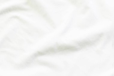 Beyaz çarşaf ve tasarımınız için boş alanı yatak takımları yakın çekim.