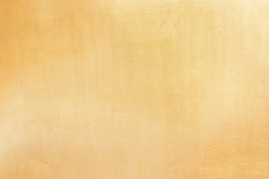 Altın soyut arkaplan veya doku ve gradyan gölgesi.