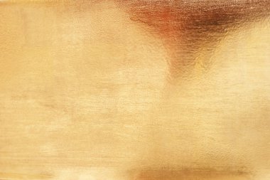 Altın soyut arkaplan veya doku ve gradyan gölgesi