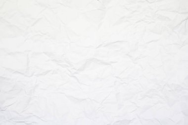 Doku veya tasarımınız için arka plan beyaz kağıt buruşuk.