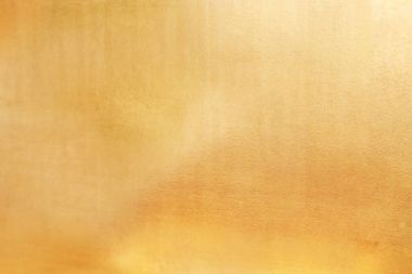 Altın soyut arkaplan veya doku ve gradyan gölgesi.