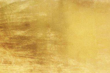 Altın soyut arkaplan veya doku ve gradyan gölgesi.