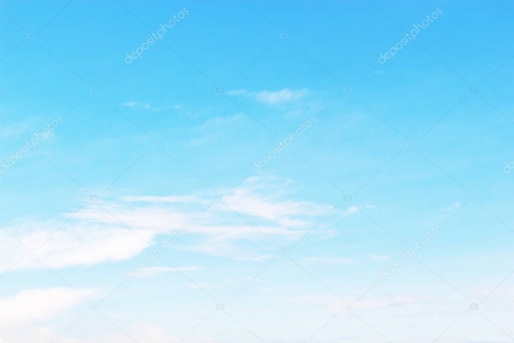 Soft white clouds against blue sky background for your design, beautiful of nature.