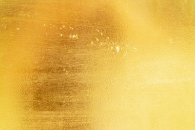 Altın arka arka plan veya doku sıkıntı çizik ve gradie