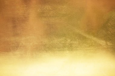 Altın soyut arkaplan veya doku ve gradyan gölgesi