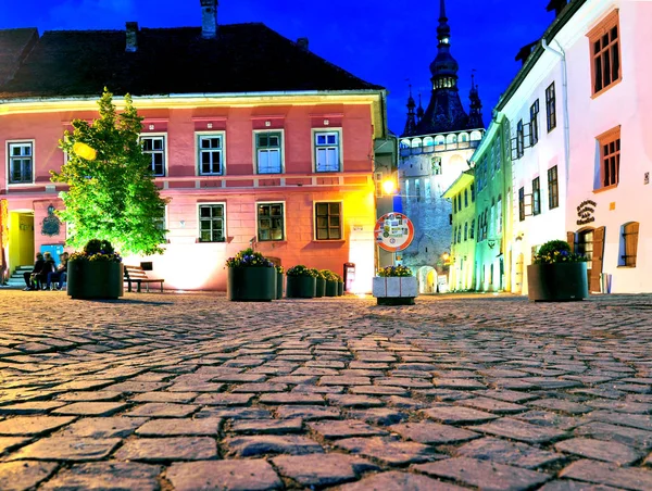 Night view of city square of Sighisoara — Stock Photo, Image