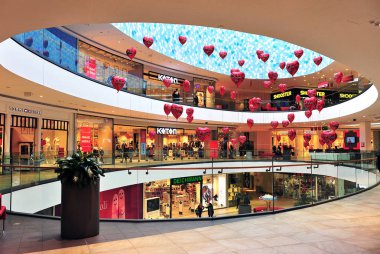 Interior of an modern city shopping centre clipart