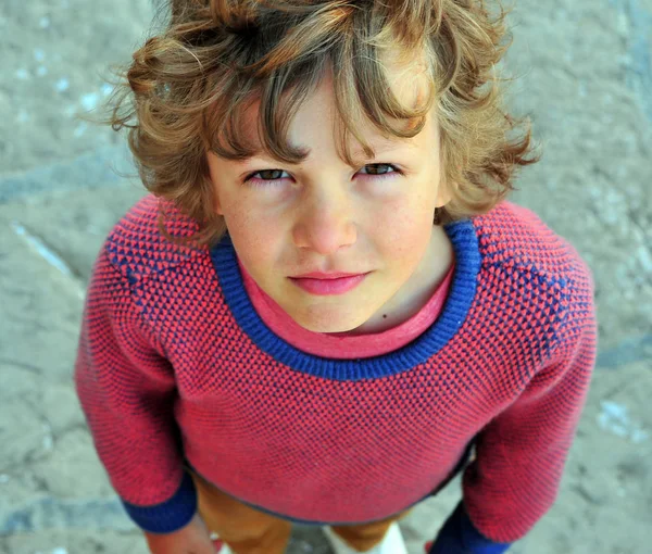 Portrait of shaggy boy looking at camera — Stock Photo, Image