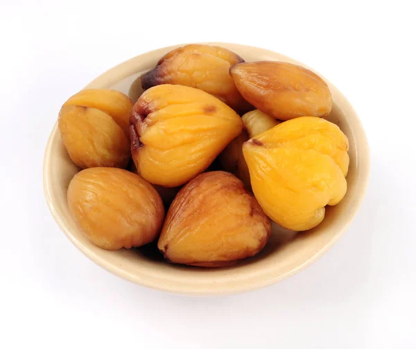 Roasted and peeled chestnuts  in bowl — Stock Photo, Image