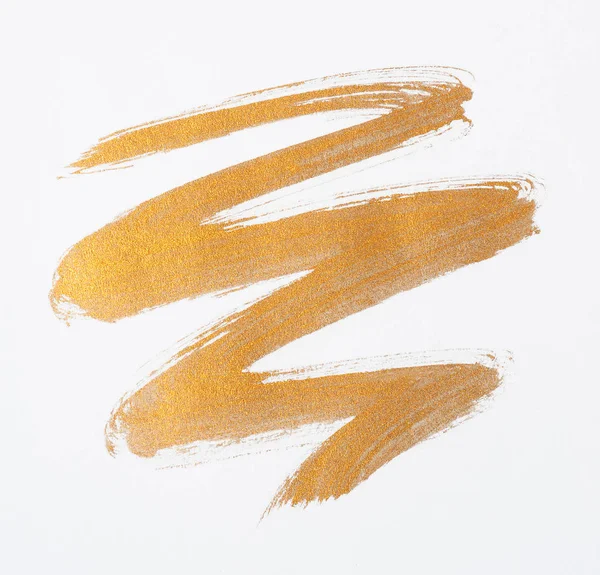 Gold paint stroke over white — Stock Photo, Image