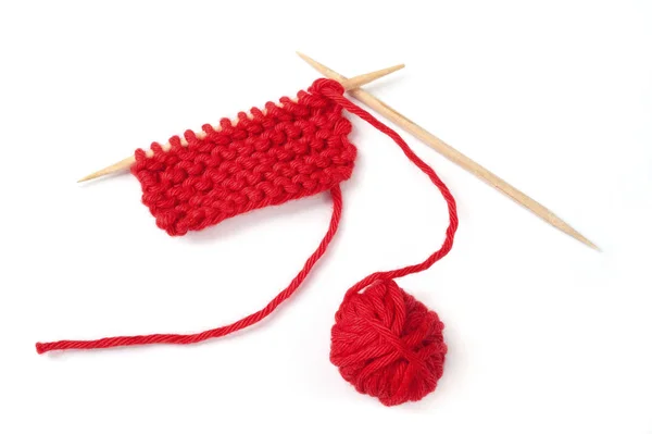 Red knitting isolated over white — Stock Photo, Image