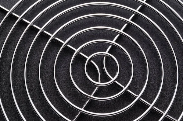 Bir metal yuvarlak kafes soyut görüntüsü. Kalp gibi atan çevrelerin arka plan.